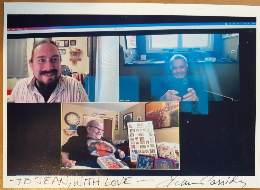 A screenshot of the video chat between Shaun Cassidy, Jean, and an unknown man. They are all older, white people.